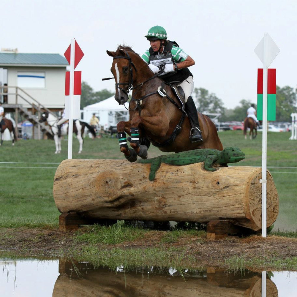 Cathy Wieschhoff and horse competing in cross country three day eventing
